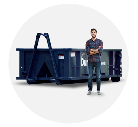 image of a ten yard dumpster with a man standing beside