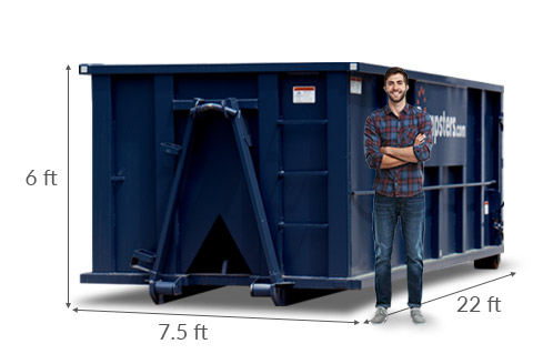 Man Standing Next to 30 yd Dumpster with Dimensions 22 feet x 7.5 feet x 6 feet