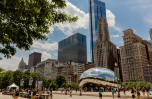 The Chicago bean with skyscrapers in the background.