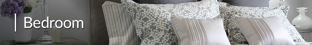 Grey and White Pillows on Bed.