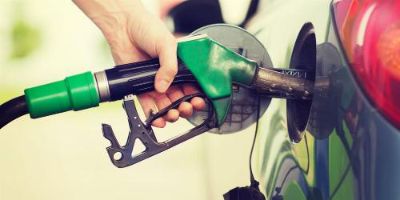 Person Pumping Gas