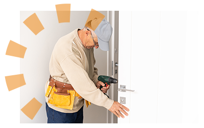 Older apartment landlord changing front door locks for new tenant.