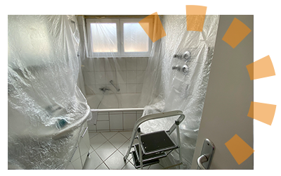 Bathroom covered in plastic tarp.