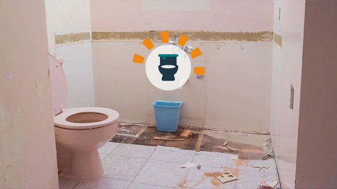 Bathroom with cabinets and tile removed