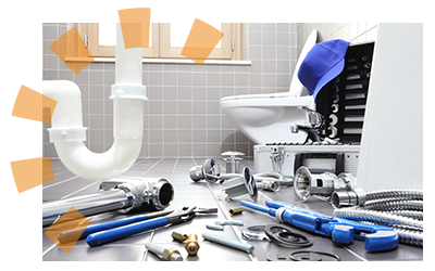 Plumbing tools and equipment in the foreground sitting on a bathroom tile floor with a toilet and removed sink in the background.