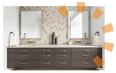 Updated bathroom with tile accent wall behind double mirrors and vanity.