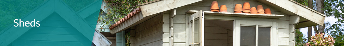The header "landscaping" over the photo of blue and white garden sheds in updated backyard with flower pots and garden flowers.