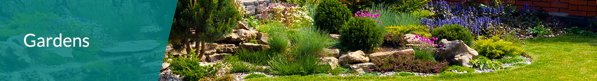 The header "landscaping" over the photo of a Botanical garden in DIY updated backyard with surrounding stone wall and gravel features.