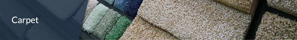 Carpet samples at a store in various colors and thickness for home flooring.