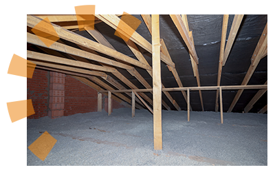 An attic full of cellulose loose-fill insulation up to the joists.
