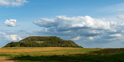 A field that covers a closed and capped landfill.