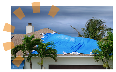 A tarp covers a hole in a home roof following a storm.