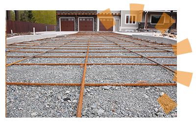 Rebar is set into place before a cement driveway is poured.