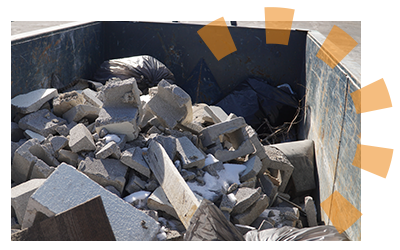 Dumpsters.com roll off dumpster filled with broken concrete slabs.