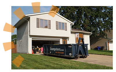 Dumpsters.com roll off dumpster in residential driveway.