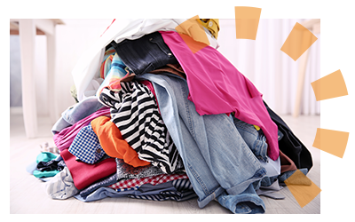 A pile of colorful clothing on the floor.