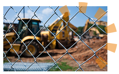 A chain link fence around a construction site.