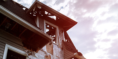 The second floor exterior of a home damaged by fire. 