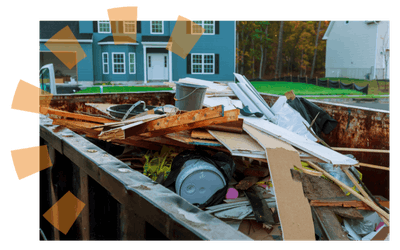 Roll off dumpster loaded with debris.