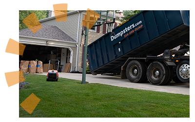 A Dumpsters.com dumpster in a residential driveway.