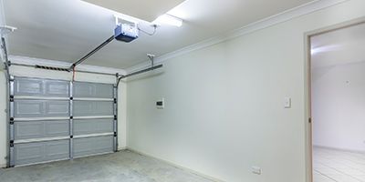 Two-Door Garage Attached to Nice Suburban Home