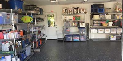 Garage Organized with Shelving Units and Storage Containers.