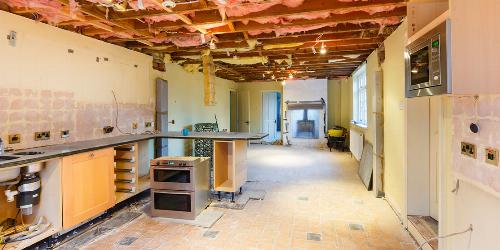 Kitchen Demolition In Progress With Appliances, Tile and Ceiling Gutted