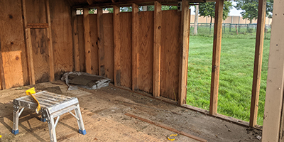 Half of a demolished shed.