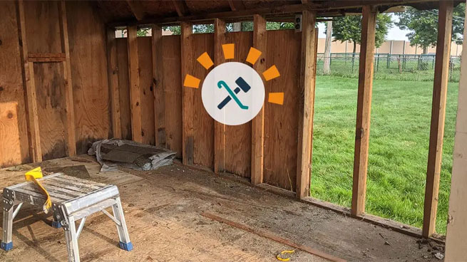 Wooden shed with missing wall
