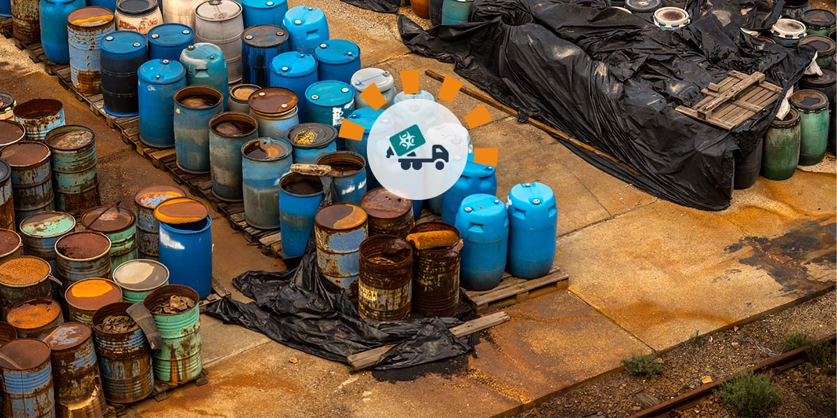 Hazardous waste containers on pallets.