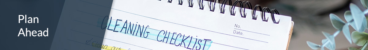 A person marks an item off a to-do checklist that includes kitchen, bathroom and bedroom tasks.