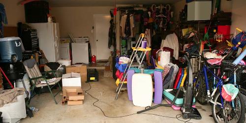 Garage Clutter With Kids’ Toys, Bikes, Clothes and Other Household Items