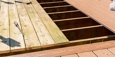 Wood deck with patio furniture.