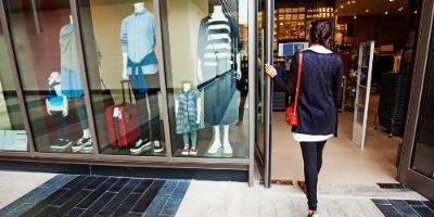 Customer Walking into a Clothing Store