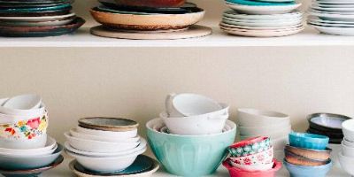 Kitchen cabinet that needs to be organized.