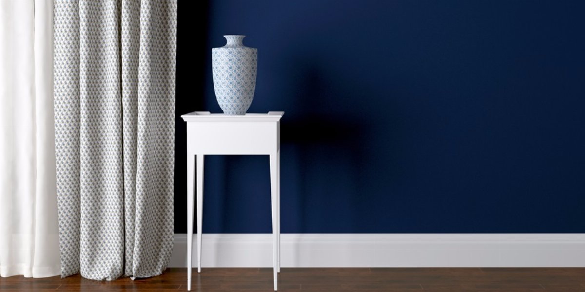 Dark blue living room paint color.