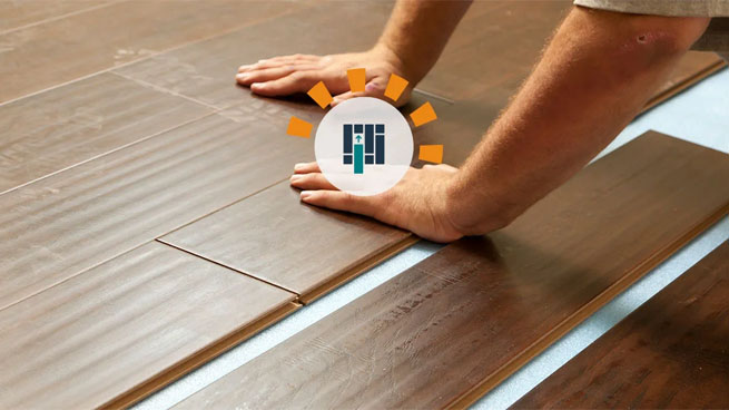 Man installing vinyl plank flooring
