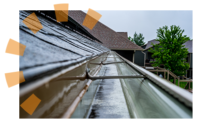 Metal hangers still holding an old gutter in place.