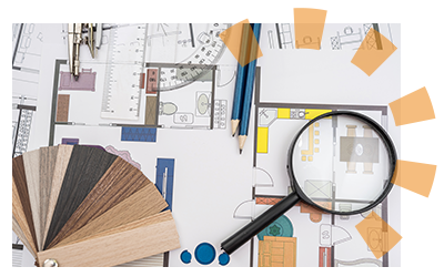 Blueprints with flooring options, a magnifying glass and other tools.