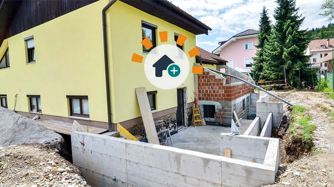 Home with new addition being built
