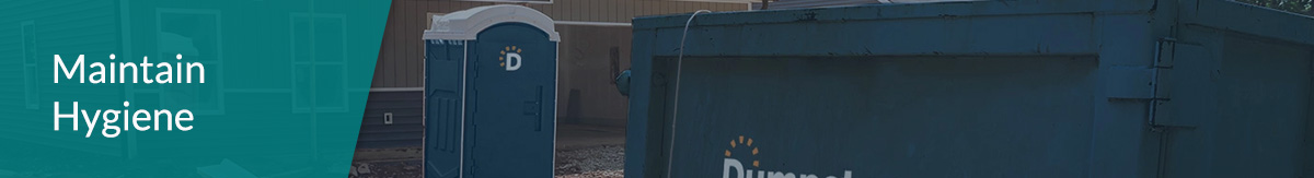 Dumpsters.com standard portable toilet sitting next to a Dumpsters.com roll off dumpster on a construction site.