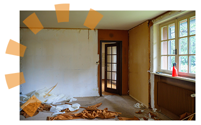 A old home interior's plaster walls being prepped for renovation. 