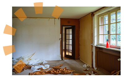 A old home interior's plaster walls being prepped for renovation.