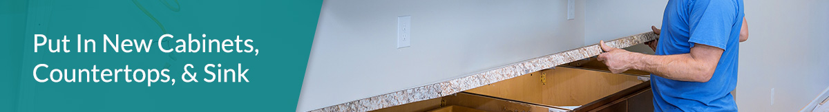 Homeowner installing new countertop in renovated laundry room.