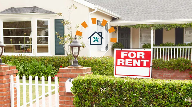 White house with For Rent sign in front