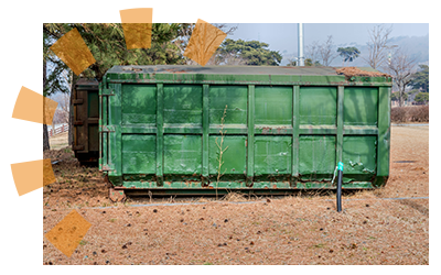 A green dumpster for rent. 