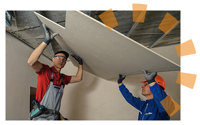 Two men installing a sheet of ceiling drywall.