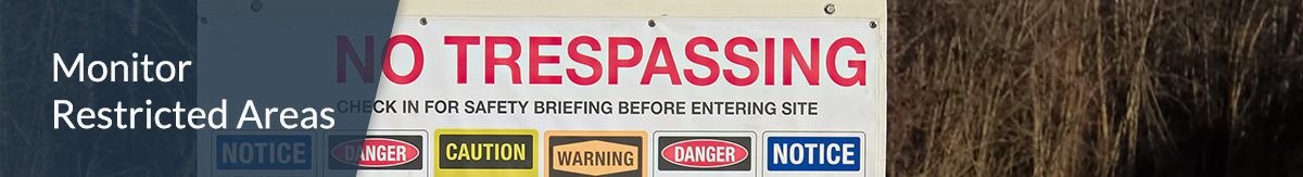 Image of a No Trespassing billboard signaling different kinds of hazards.