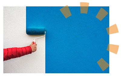 A person using a roller to paint a white wall blue.