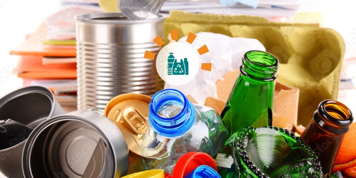 Glass, plastic and metal in a pile for recycling.
